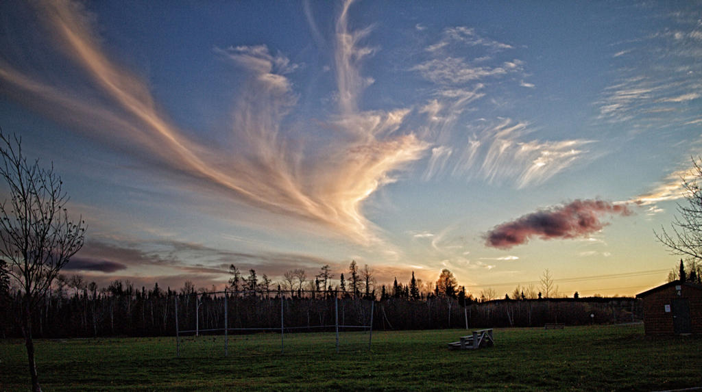 clouds_at_sunset_by_tricky_trees-daqbx9q.jpg